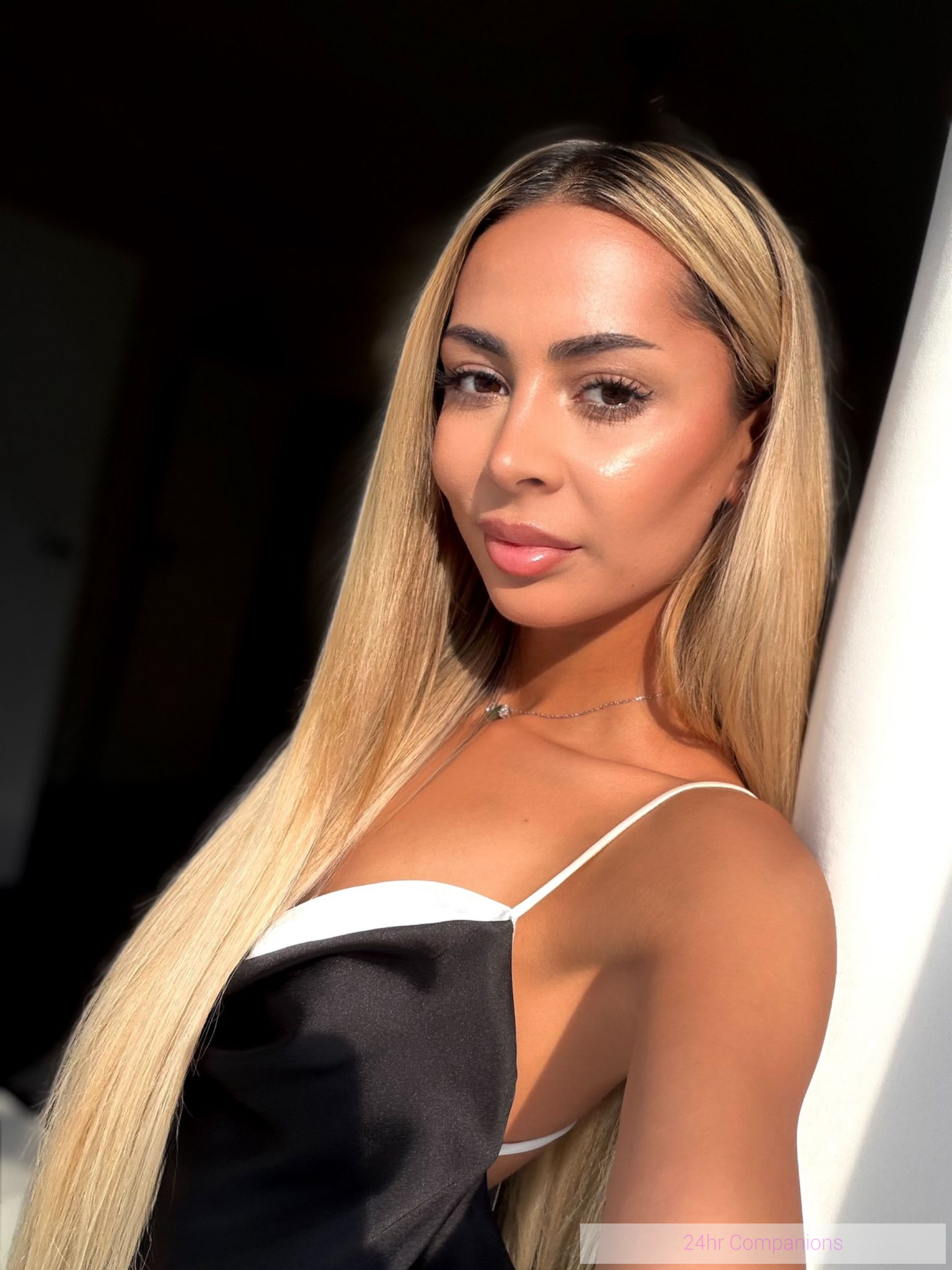 An elegant companion who radiates a charming smile and exudes natural beauty.