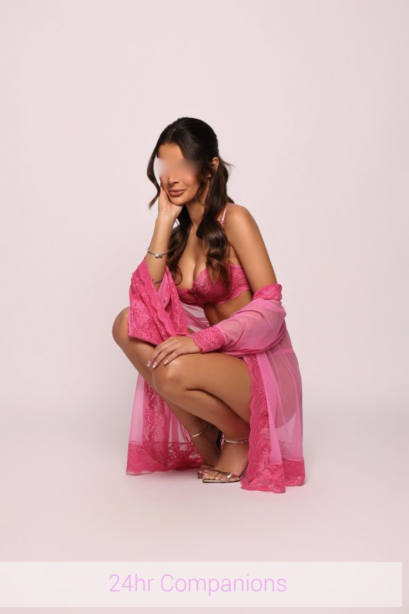 Danielle, a talented companion, proudly showcases her stunning, graceful curves.