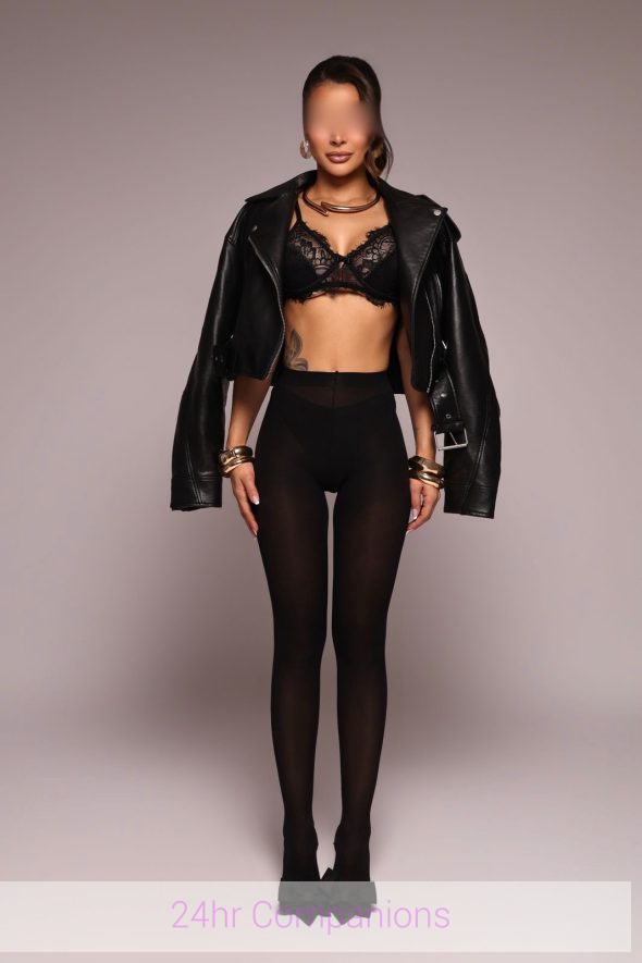 Danielle radiates charm as she proudly showcases her natural beauty.