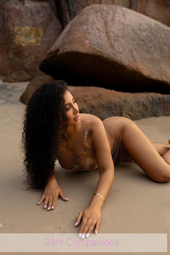 Harmony gently showcases her graceful, curvy figure from a lovely side view.